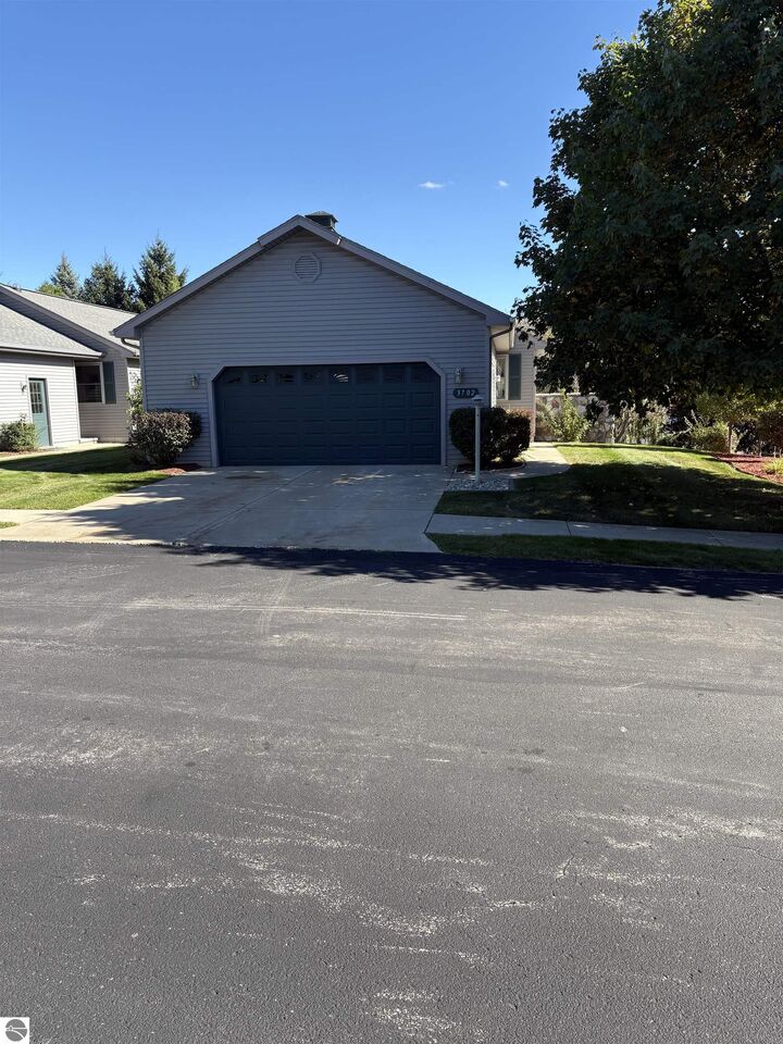Property Photo:  3702 Creekside Drive  MI 49684 