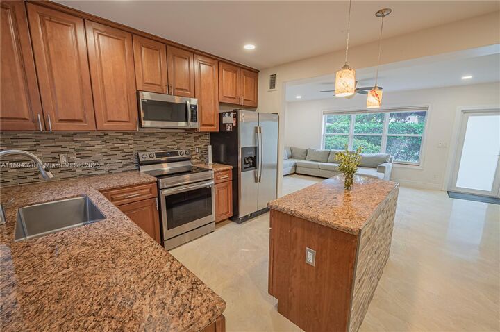 Property Photo: 735 NW 122nd St FL 33168