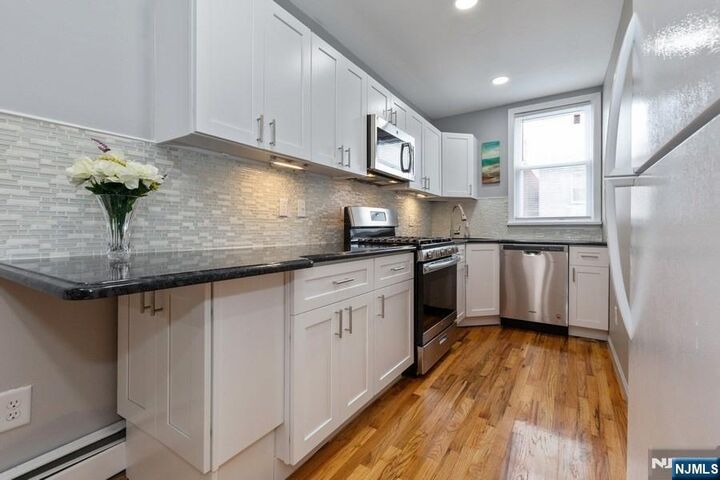 Property Photo:  115-117 66th Street 9  NJ 07093