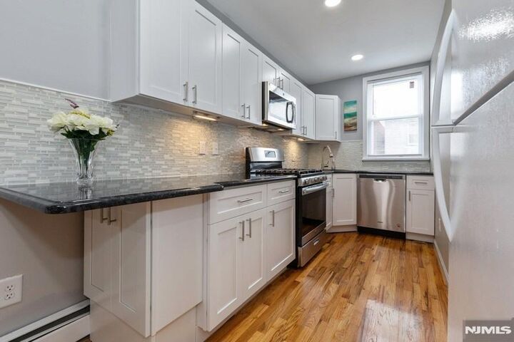 Property Photo:  115-117 66th Street 9  NJ 07093 