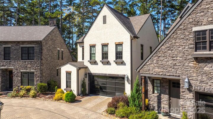 Property Photo:  208 Ambleside Village Lane  NC 28036