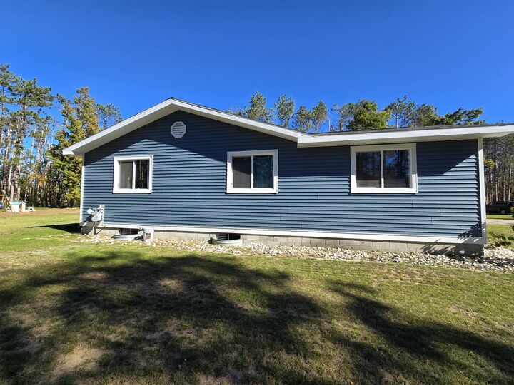 Property Photo:  210 N Estates Drive  MI 49735 