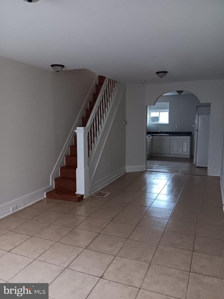 Property Photo: 117 N Glover Street MD 21224