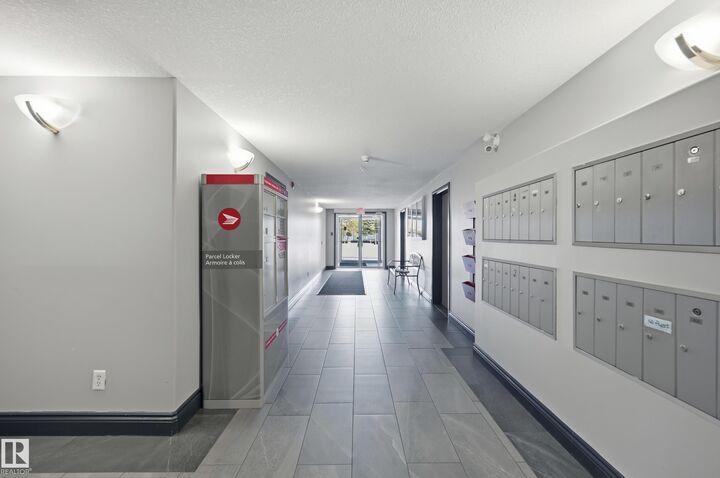 Property Photo:  9930 100 211  AB T8L 4P3 