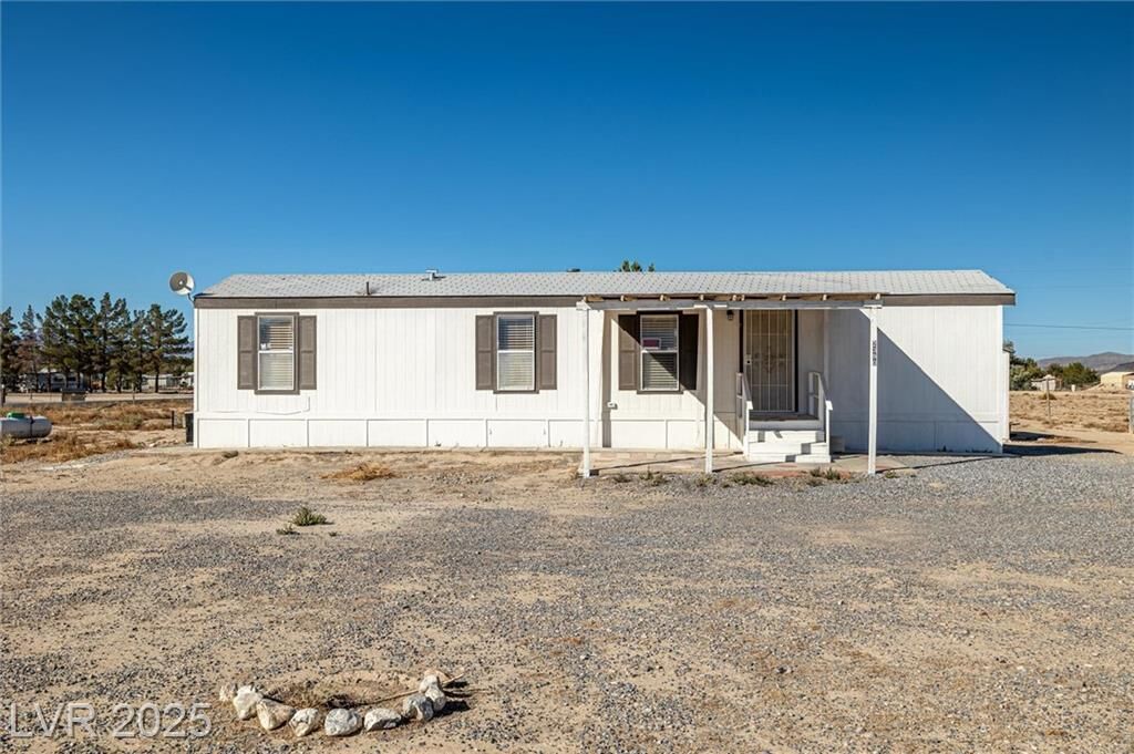 Property Photo:  2390 North Lola Lane  NV 89060 
