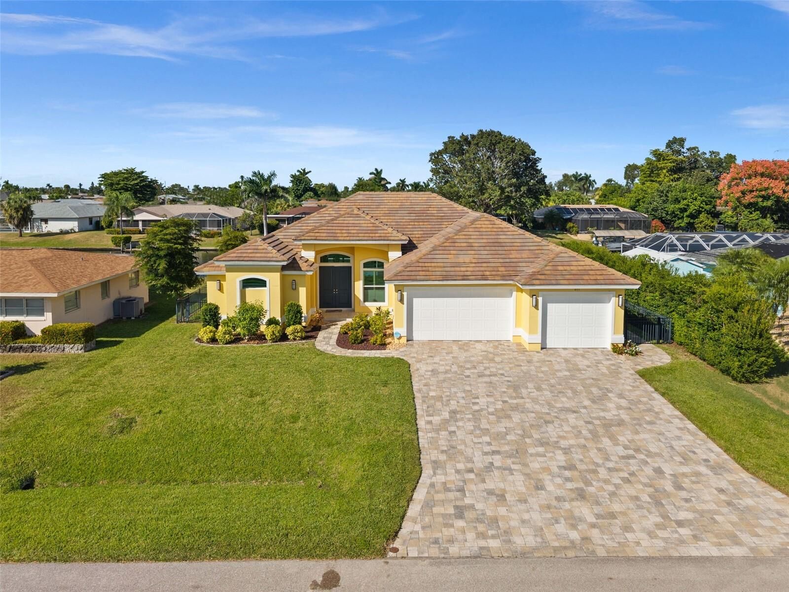 Property Photo: 211 SE 37th Lane FL 33904