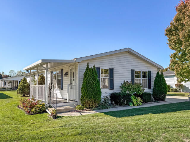 Property Photo:  316 Cadgewith E  MI 48906