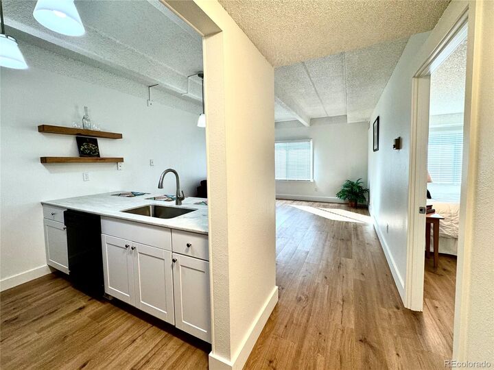 Property Photo: 7877 E Mississippi Avenue 103 CO 80247