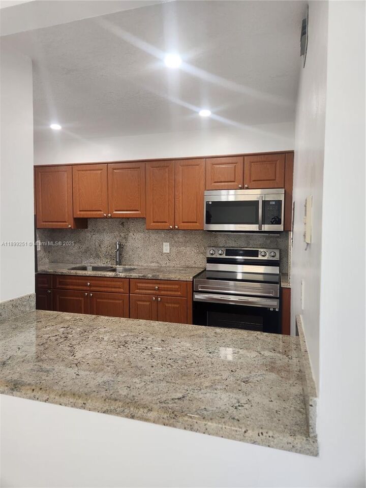 Property Photo:  802 NW 87th Ave 420  FL 33172