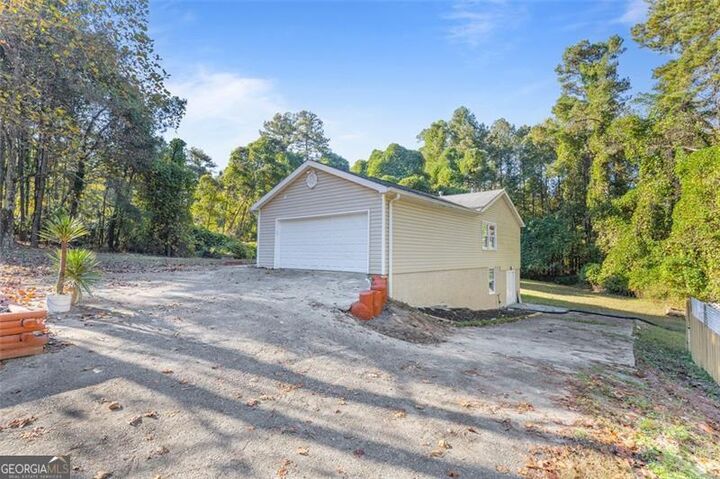 Property Photo:  667 Alcovy Forest Drive  GA 30045