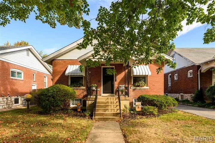 Property Photo:  6811 Marquette Avenue  MO 63139 