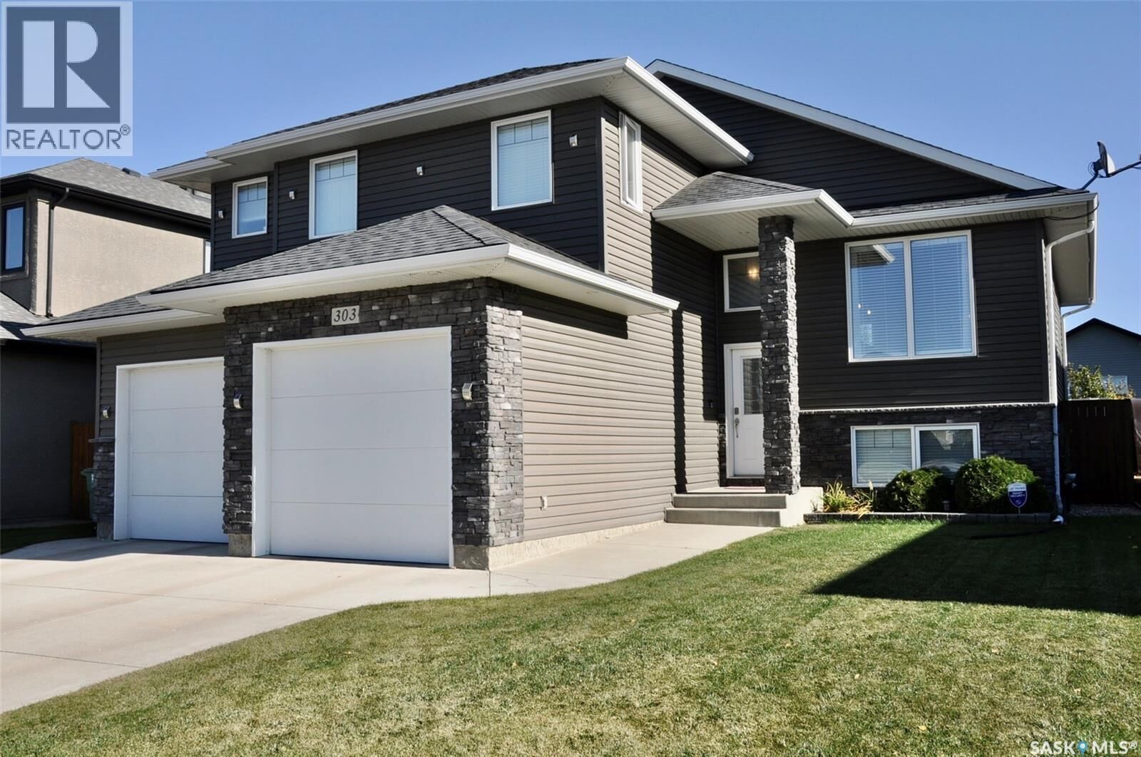 Property Photo:  303 Roy Crescent  SK S7W 0L1