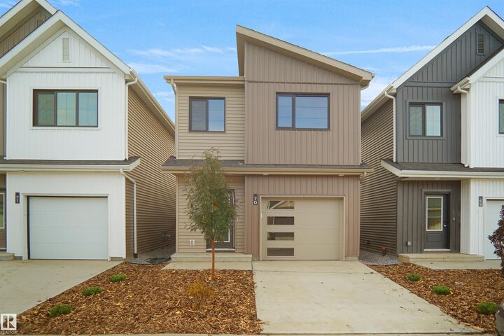 Property Photo: 1430 Aster Way NW 24 AB T6T 2N8