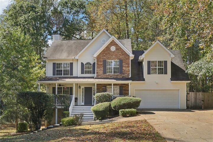 Property Photo:  7670 Rose Lane  GA 30040 