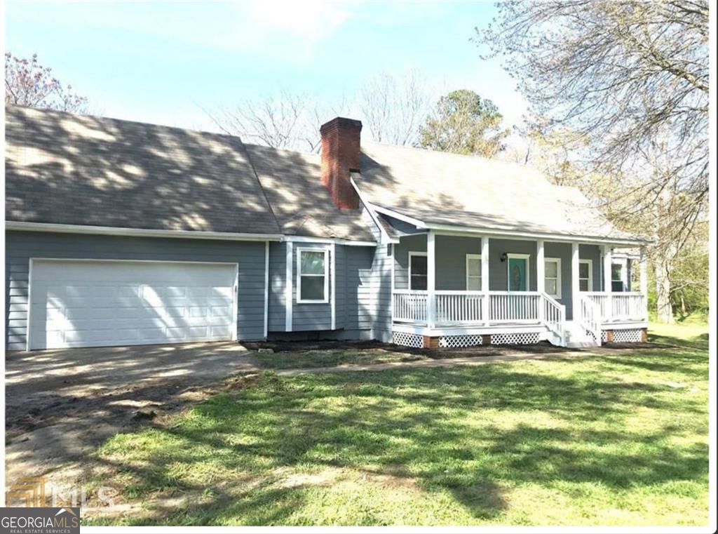 Property Photo: 6744 Rockbridge Road GA 30087