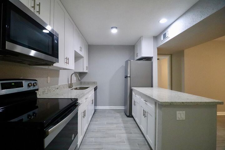 Property Photo:  5929 Queensloch Drive 235  TX 77096