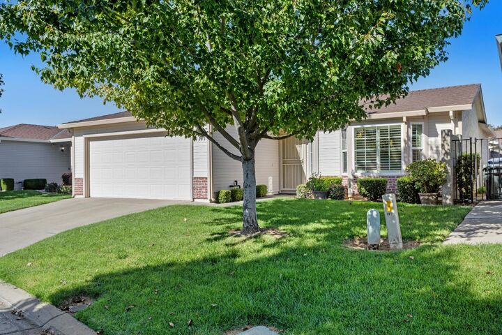 Property Photo: 7309 Sunleaf Lane CA 95828