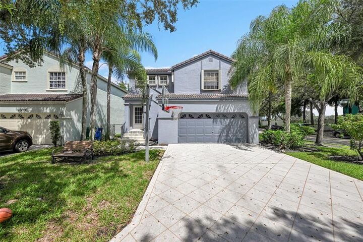 Property Photo:  11711 SW 1st St  FL 33071 