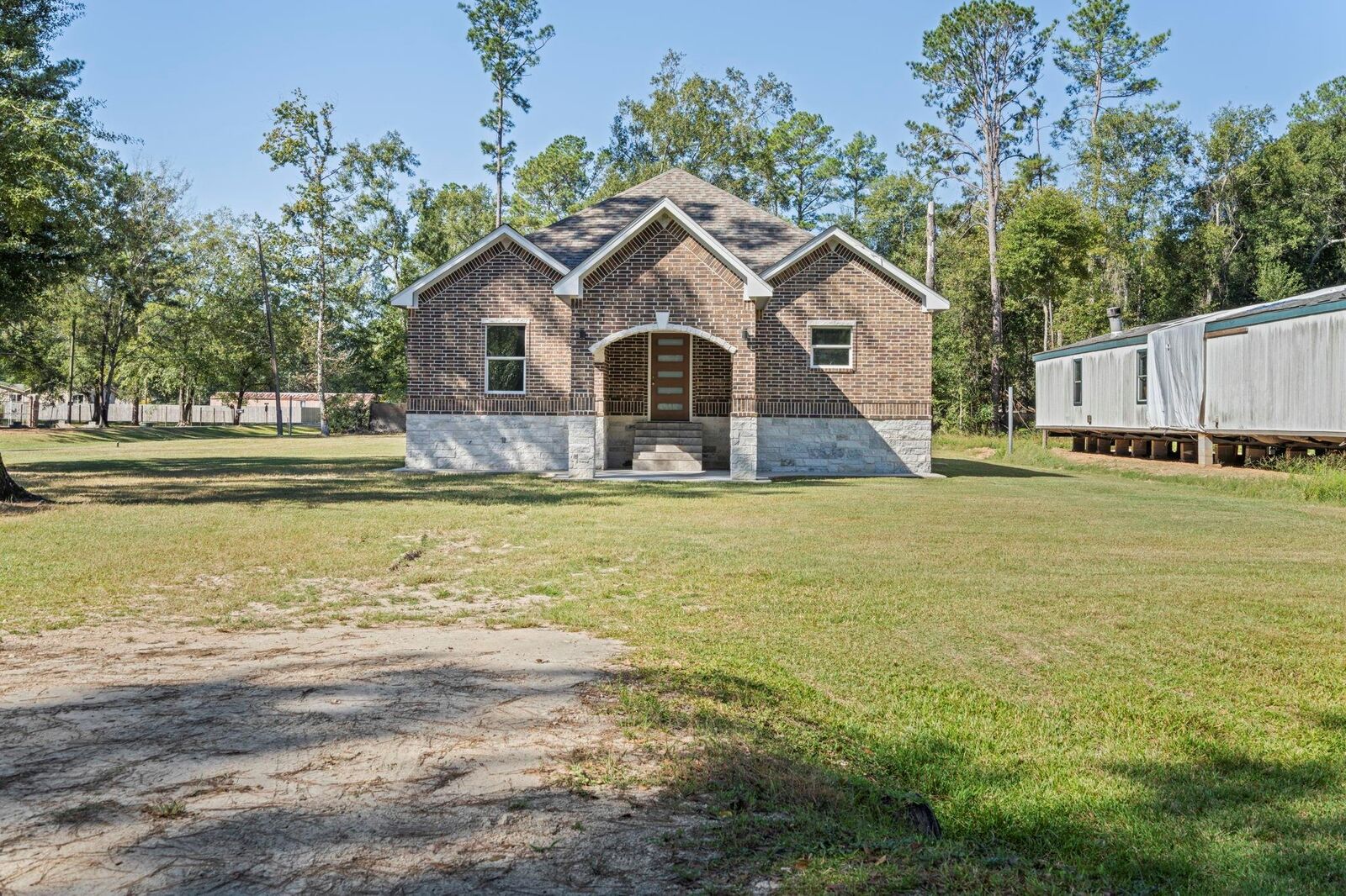 Property Photo:  138 County Road 3314  TX 77327 