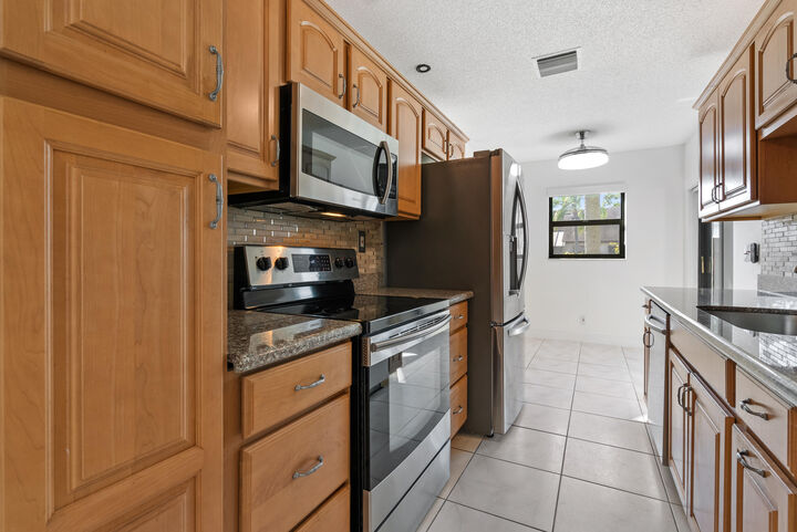 Property Photo:  5110 Nesting Way B  FL 33484
