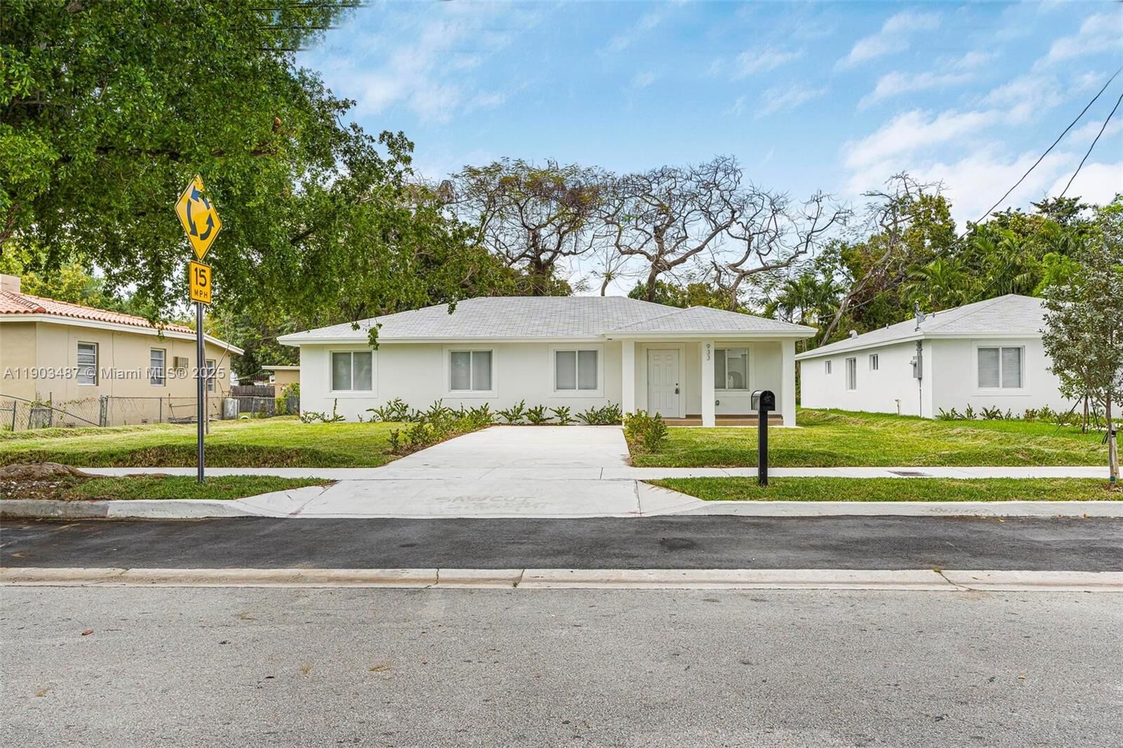 Property Photo:  933 NW 50th St  FL 33127