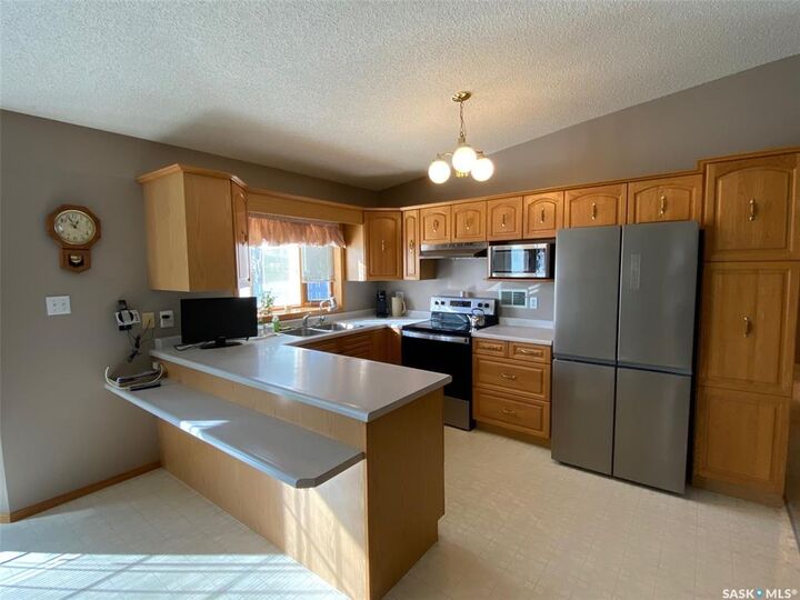Property Photo:  205 Morrison Drive  SK S3N 4A1 
