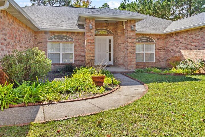 Property Photo:  8335 Onich Drive  FL 32566 