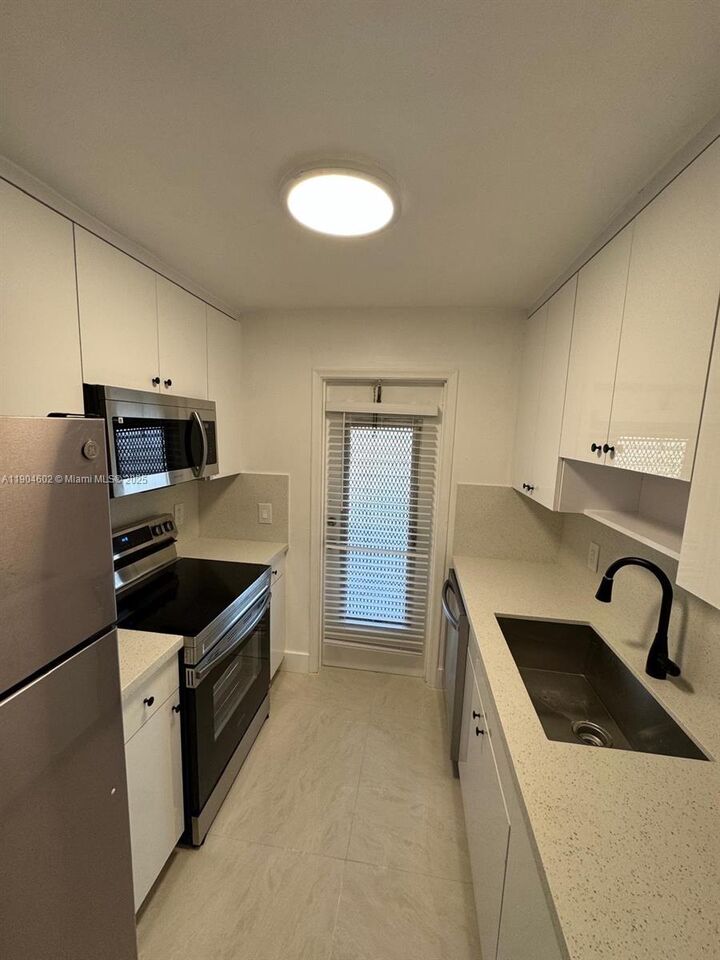 Property Photo:  2418 Polk St 104  FL 33020 