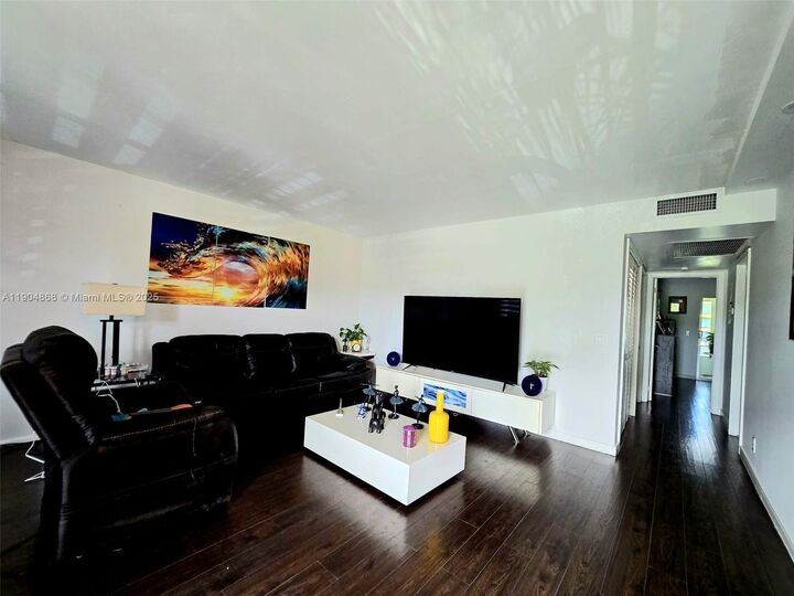 Property Photo:  1401 SW 135th Ter 213H  FL 33027