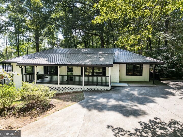 Property Photo:  3058 White Road NE  GA 30012