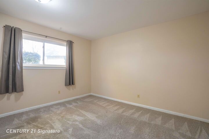 Property Photo:  105 Provincial Court Ct 3  MI 48638