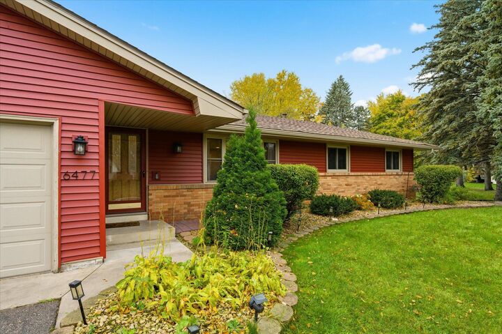 Property Photo:  6477 Deerwood Lane N  MN 55369 