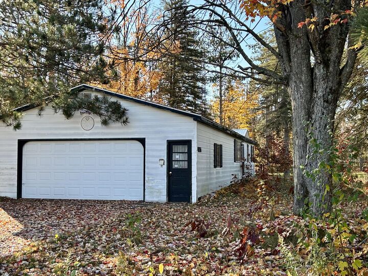 Property Photo:  4927 Henry Drive  MI 49735 