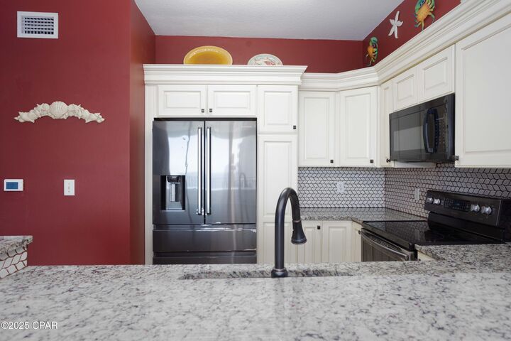 Property Photo:  9900 S Thomas Drive 2114  FL 32408