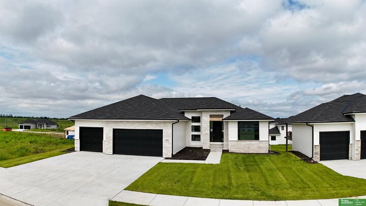 Property Photo: 5430 N 212 Avenue NE 68022