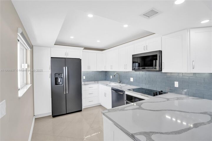 Property Photo:  300 Ocean Trail Way 108  FL 33477 