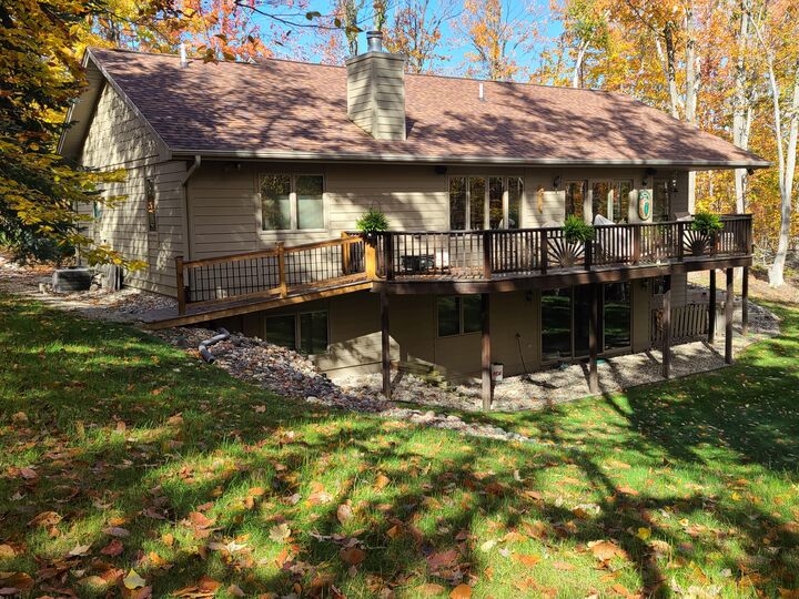 Property Photo:  1345 Downhill Run  MI 49735 