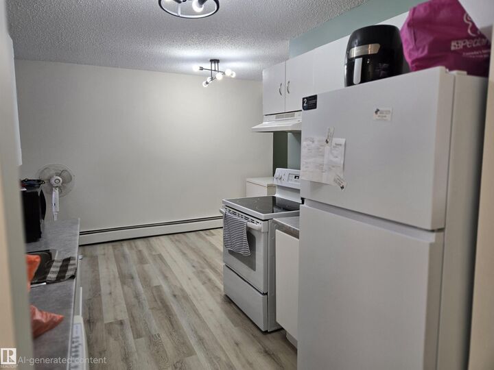 Property Photo: 10730 112 Street NW 108 AB T5H 3H1