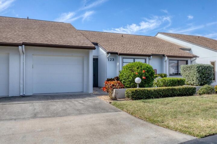 Property Photo:  1211 Capri Isles Boulevard 123  FL 34292 