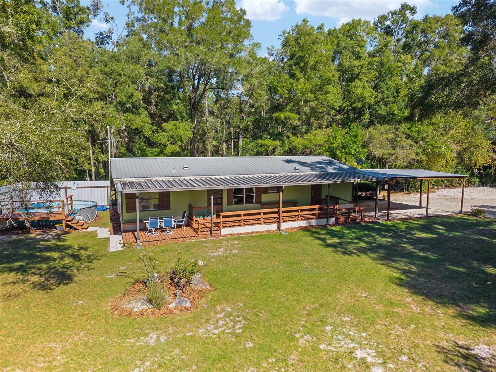 Property Photo:  16513 SW 67th Place  FL 32618 