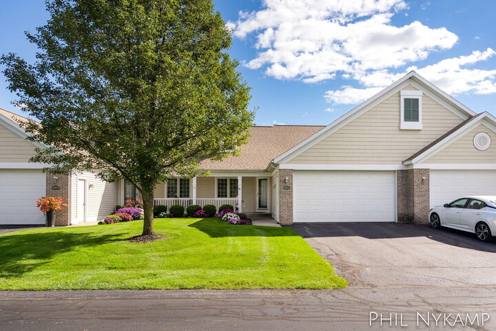 Property Photo:  8870 N Peninsula Court  MI 49464 
