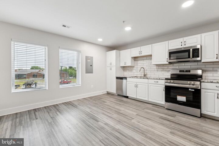 Property Photo:  19520 Village Walk Drive 3-201  MD 20886 