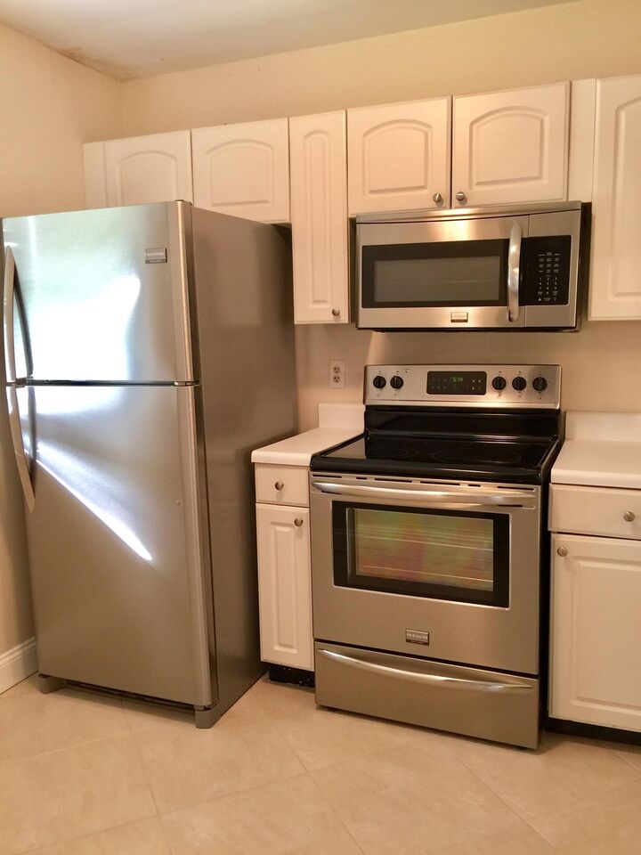 Property Photo:  6772 Palmetto Circle S 104  FL 33433 