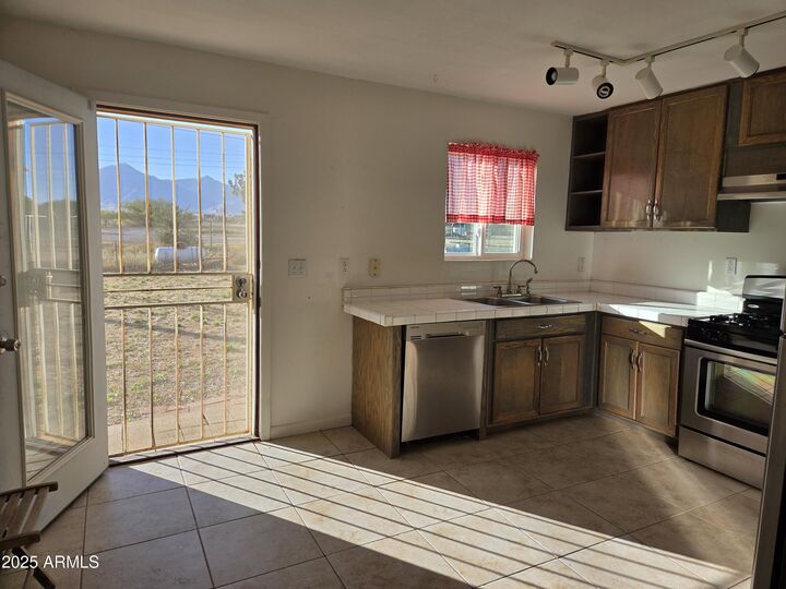 Property Photo:  9920 S Rancho Drive  AZ 85615 