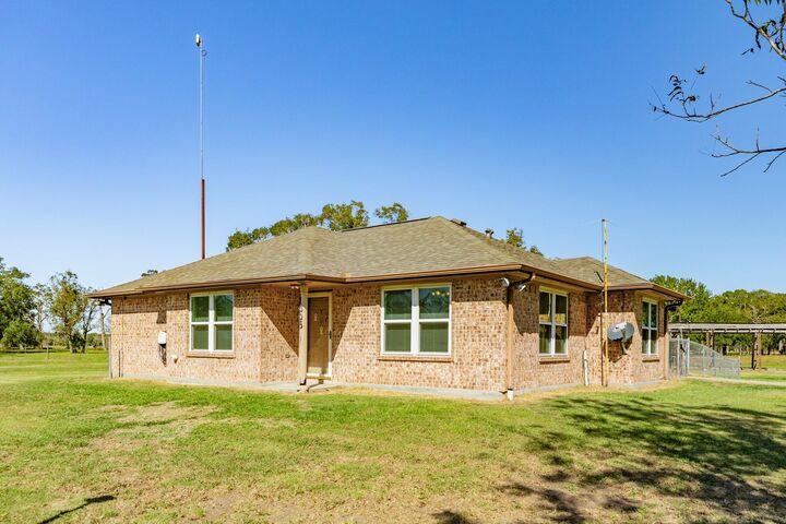 Property Photo: 1005 County Road 164 TX 77414