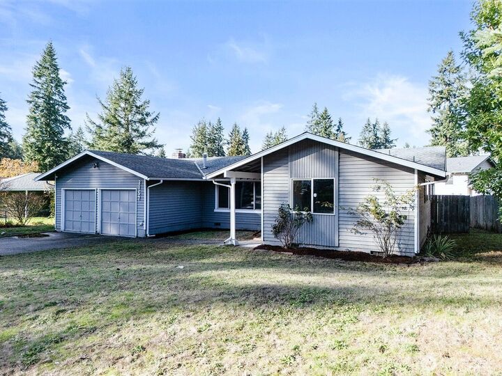Property Photo: 3157 SE Villa Carmel Drive WA 98366
