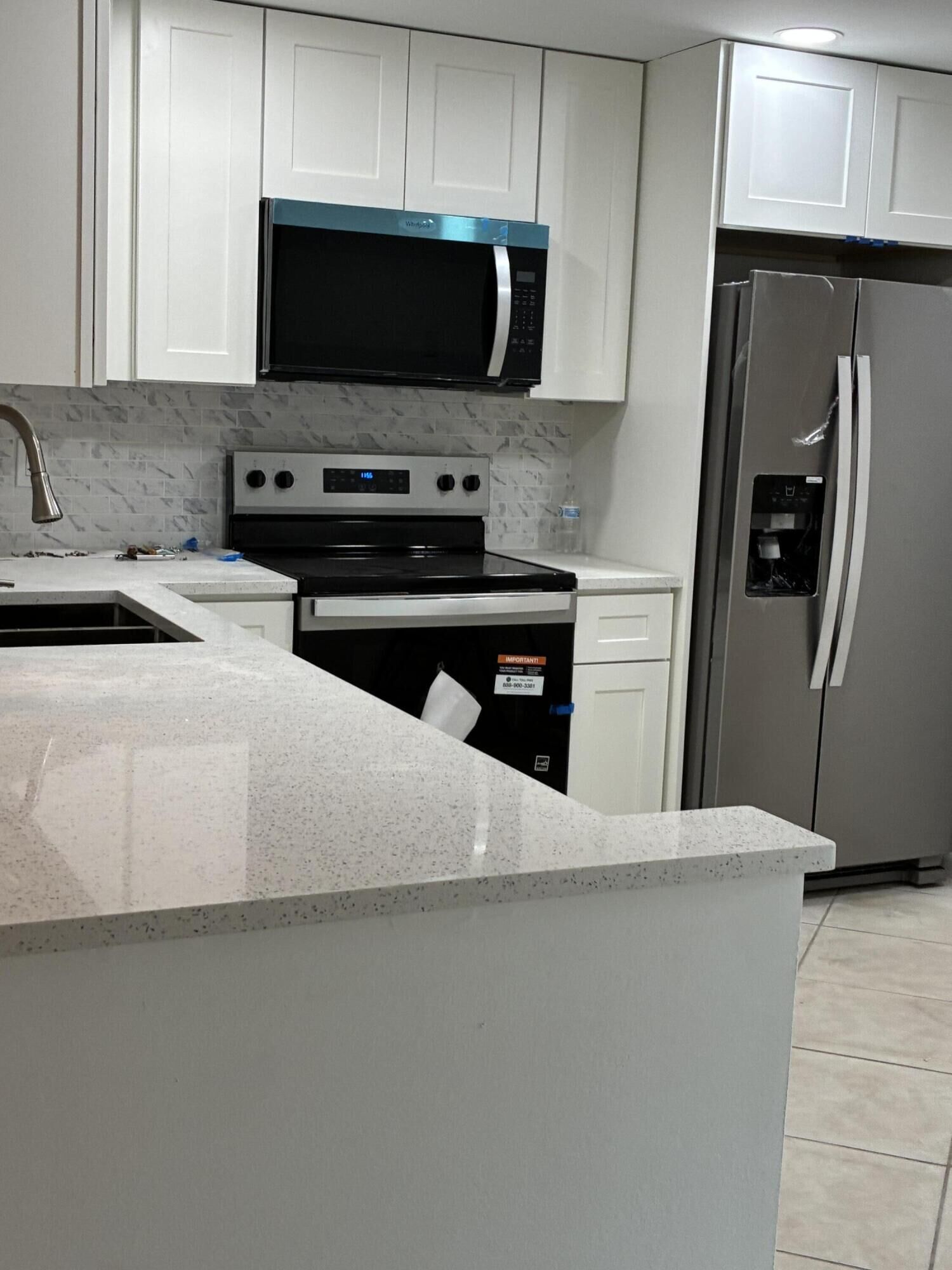 Property Photo:  2615 NE 3rd Court 103  FL 33435 