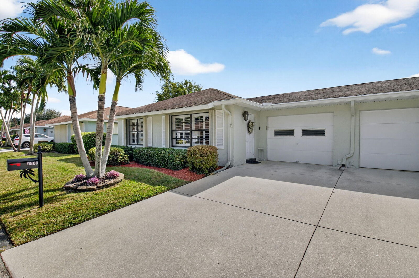 Property Photo:  9800 Tabebuia Tree Drive A  FL 33436 