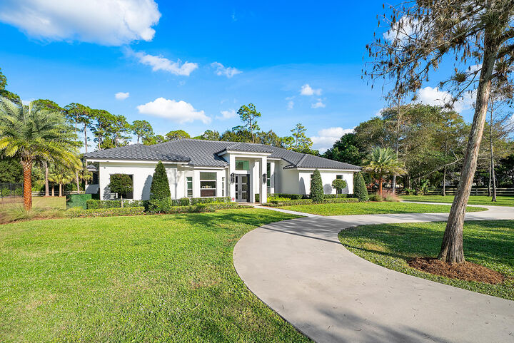 Property Photo: 704 Deerwood Court FL 33414