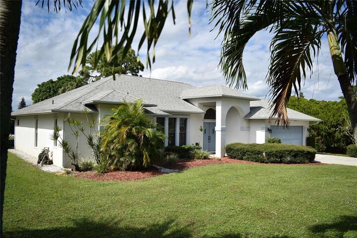 Property Photo: 1928 NW Pine Lake Dr FL 34994